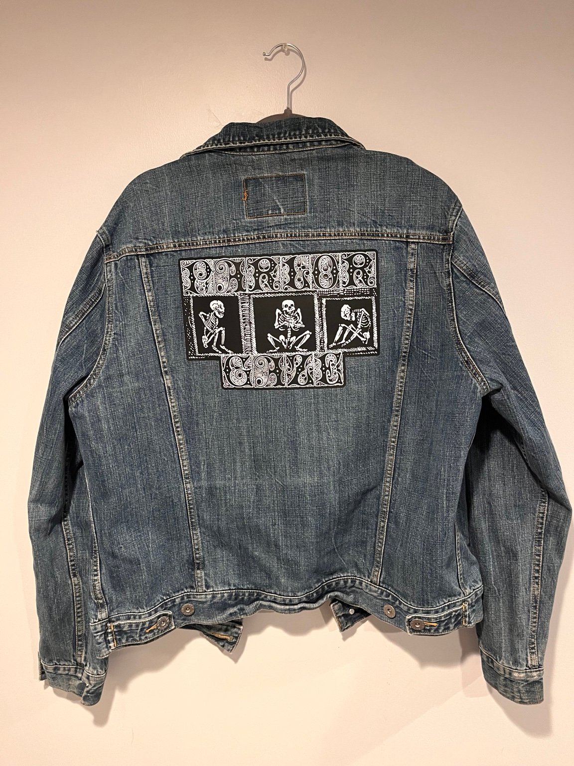 Printed denim jacket with a large back graphic
